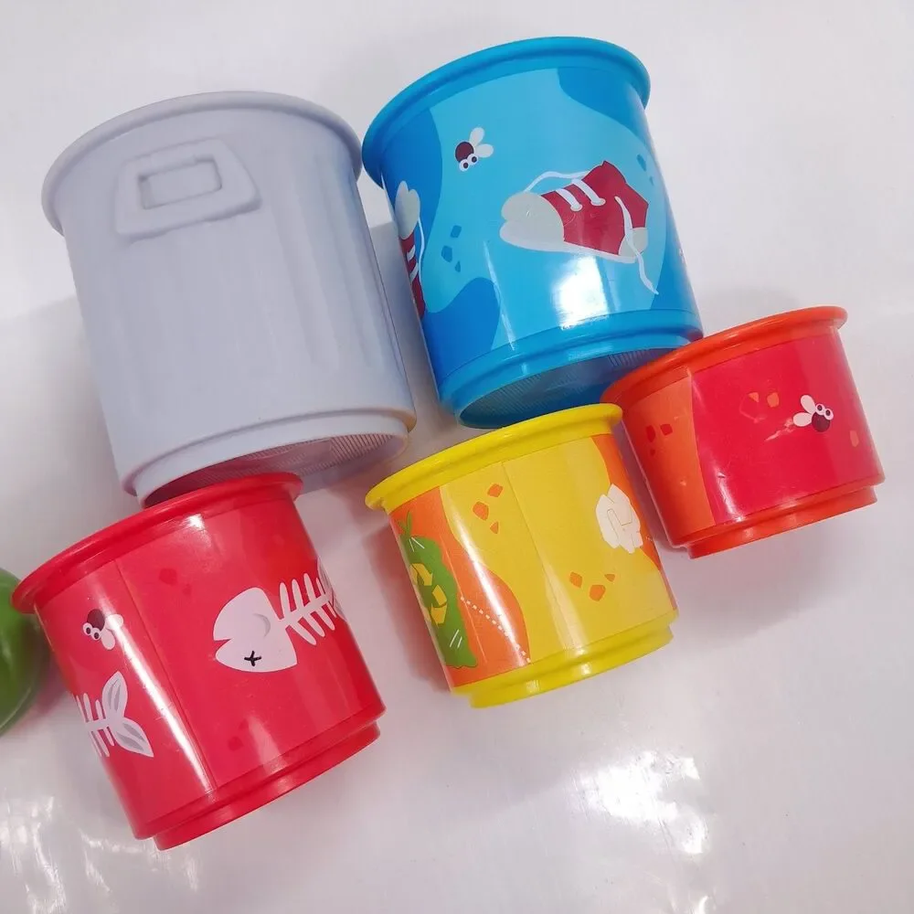 Bright Starts Sesame Street Oscar the Grouch's Stacking Cans nesting baby toy